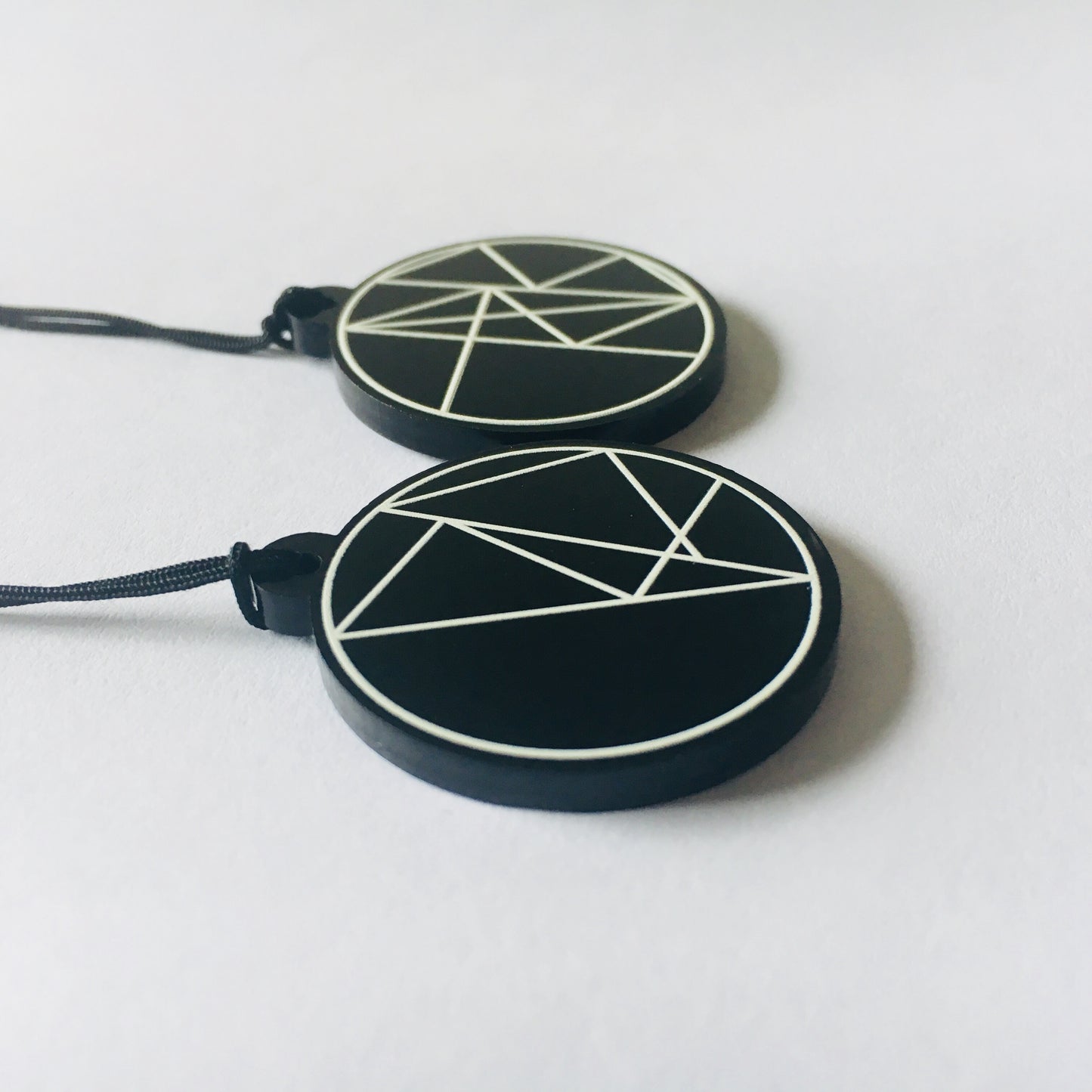 RETRIBUTION and PREVAIL sigil acrylic charms